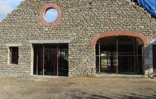 rénovation d'une façade en pierres par l'entreprise Scarabotto